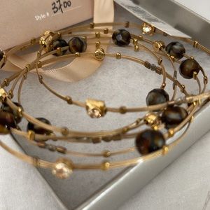 Whispers bracelet set.  New in box
